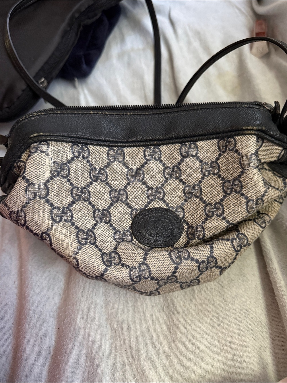 Vintage Gucci Beige and Black GG Canvas Crossbody Bag. Condition reflects price.